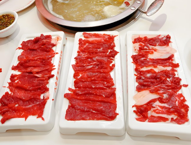 ?？鹂瘐r切牛肉自助火鍋加盟